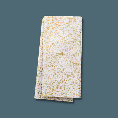 Gold dots all over paper