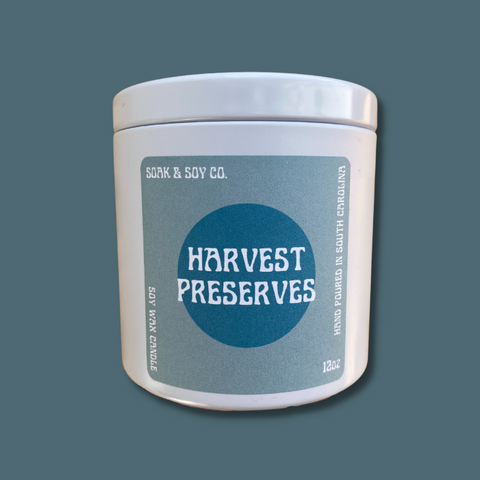 Candle in white tin