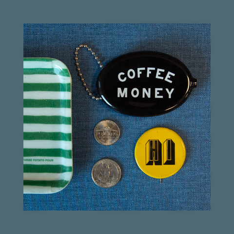 Black pouch with white text