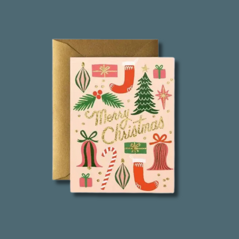 Christmas items surrounding sparkly text