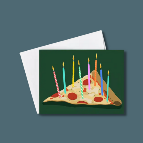 Pizza slice with candles in it