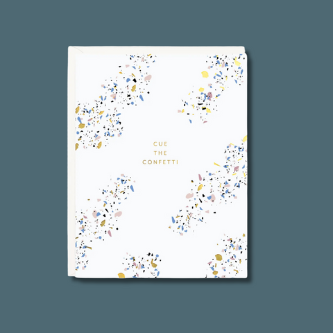 Gold text among confetti