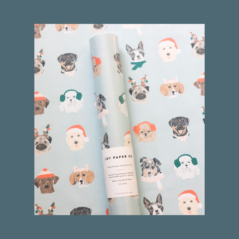 Dogs in scarves and earmuffs on blue