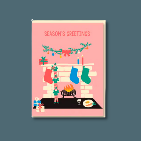 Elves putting up stockings