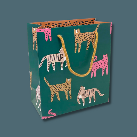 Wild cats on dark green