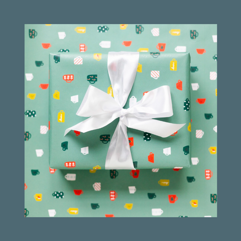 Coffee mugs on green background