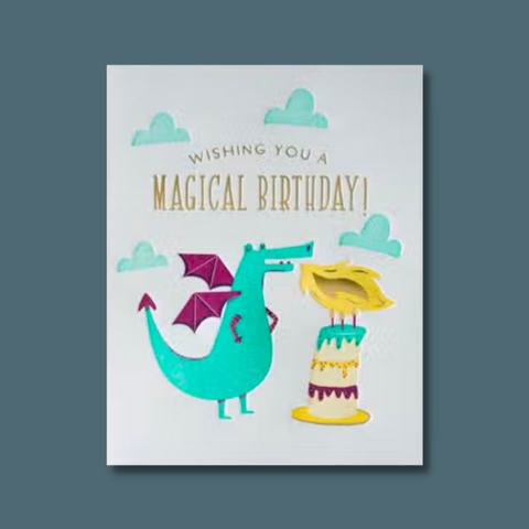 Dragon blowing on cake candles
