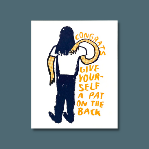 Person giving pat on the back