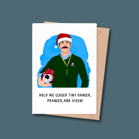 Ted Lasso in a Santa hat