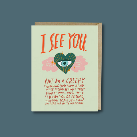 Text and a heart with an eye