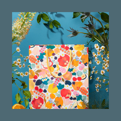 Bag covered in fruits and florals