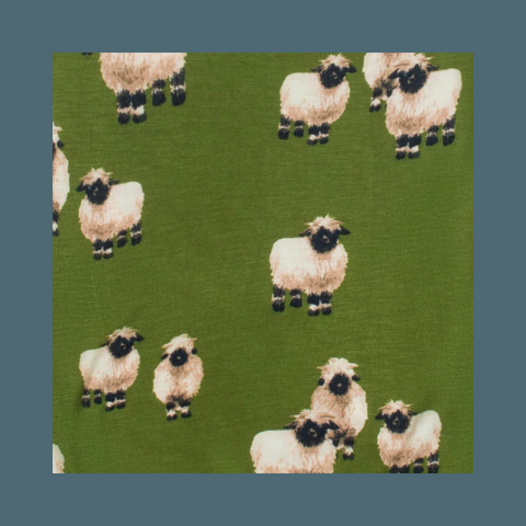Sheeps on dark green