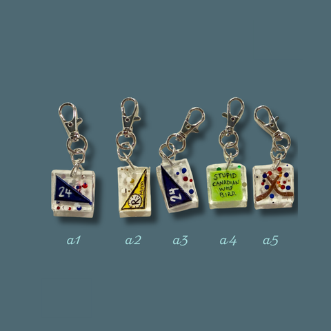 Heated Rivalry Bag Charms