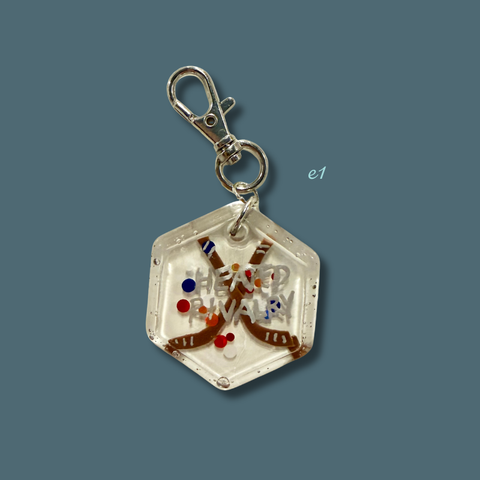 Heated Rivalry Bag Charms