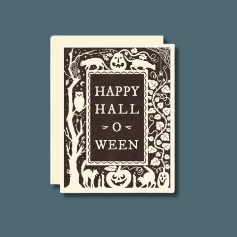 Halloween-themed card with decorative border and 'Happy Hall O'ween' text on a black background