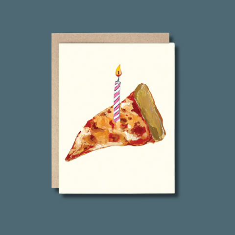 Pizza slice with candle in it