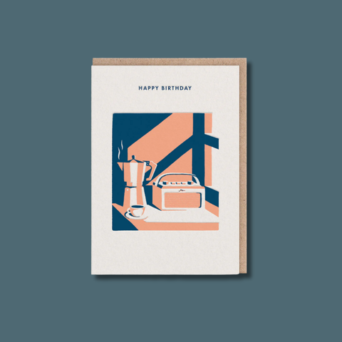 Birthday card with illustration of a coffee maker and radio on a blue background