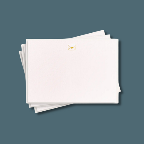 Notecards with small gold envelope at top with a heart seal