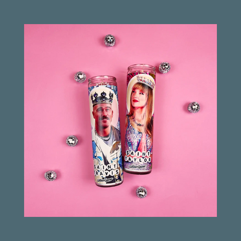 Taylor candle next to a Travis candle