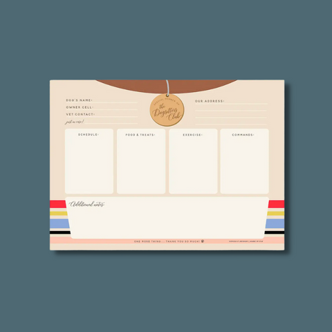 Cream pad with multicolored stripes and a tan tag