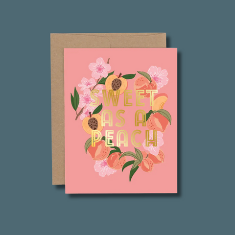 Peaches and blossoms with gold text