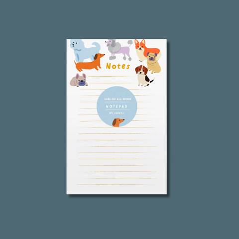 Multicolored dogs at the top of the notepad