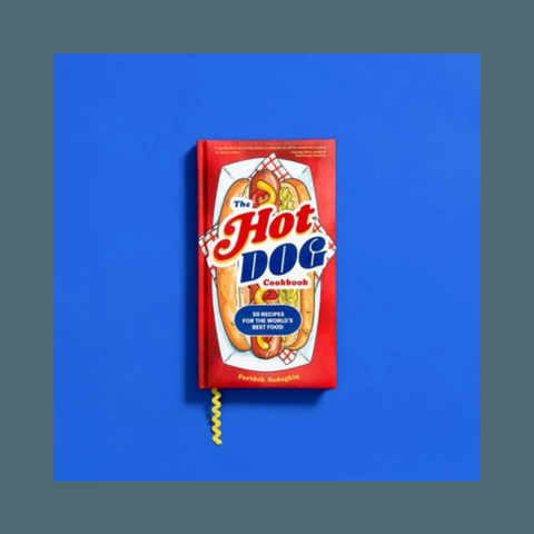 Red cookbook titled 'The Hot Dog Cookbook' on a blue background