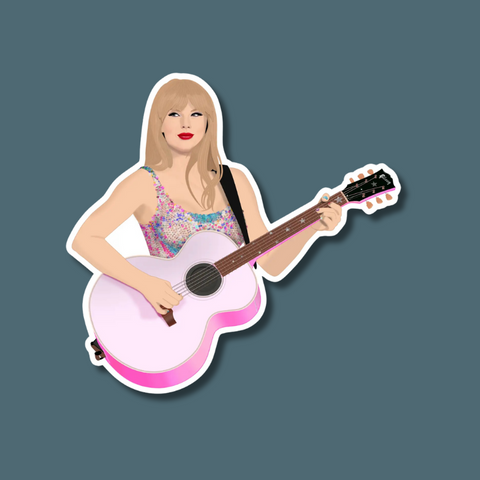 Taylor holding her guitar